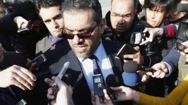 المعارض السوري أنس العبدة يتحدث لوسائل الإعلام في جنيف

