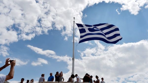 Greek flag atop the Acropolis archaeological site. (AFP/ File Photo)