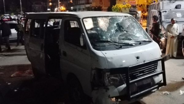 The remains of the police bus, shot at by multiple masked gunmen. (AFP/Stringer)