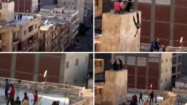  A combo of image grab taken from a video uploaded to YouTube on July 5, 2013, shows an unidentified group of men taking refuge atop of a building while being surrounded by another group of men (Top-L), hurled of a ledge onto the roof of a building (Top-R, Bottom-L), and then beaten (Bottom-R) (Youtube / AFP)