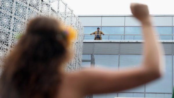  A bare-breasted activists from the women's rights-group Femen protesting outside the Saudi embassy against the prohibition on women driving in Saudi Arabia on October 28, 2013 in Berlin, Germany. [Getty Images]