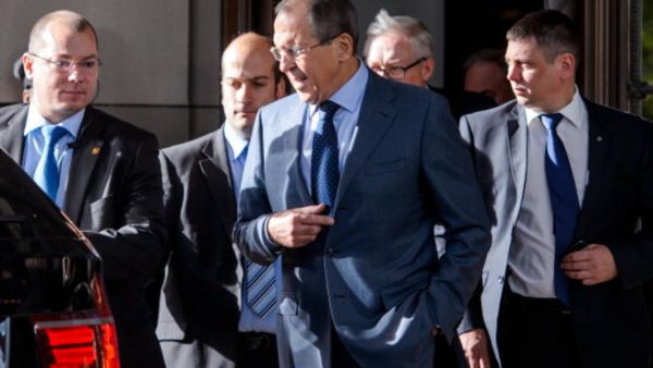 Russian Foreign Minister Sergei Lavrov leaves the Intercontinental Hotel on the third day of talks on Iran's nuclear program, on November 9, 2013 in Geneva.[AFP]