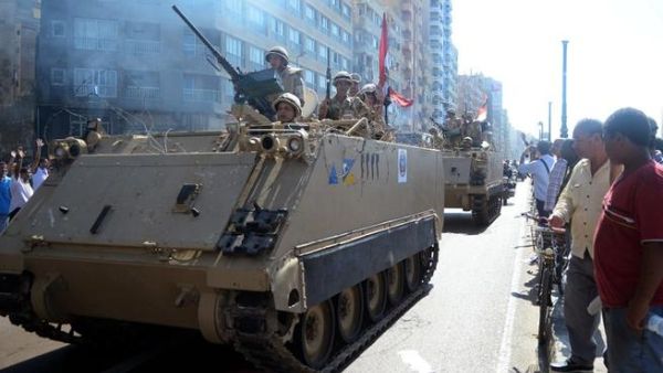 Egyptian security forces patrol after attacks. [AFP]