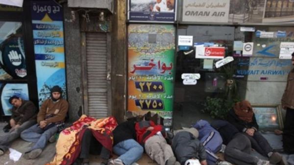 مصريون مناؤون لحكم مبارك في ميدان التحرير/أ.ف.ب