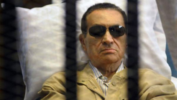 Egypt's former president inside a barred cage in the police academy courthouse in Cairo, Egypt. [alahram]