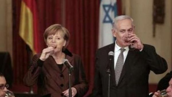 نتانياهو خلال مؤتمر صحفي مع المستشارة الالمانية انغيلا ميركل