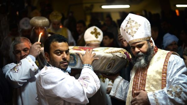 Egyptian Coptic Christian religious leaders celebrate Christmas in the monastery of Saint Samaan in Cairo on January 6, 2015. (AFP/File)