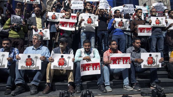 Thousands of activists, as well as several journalists, have been detained since former army chief and now President Abdel Fattah al-Sisi overthrew predecessor Mohamed Morsi in 2013. (AFP/Mohamed El-Shahed)