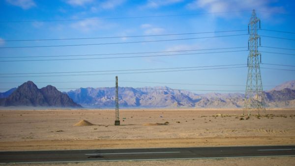 Electrical interconnection lines between Egypt and Saudi Arabia are scheduled to begin operation in the beginning of 2021, with a capacity of 3,000 MW. (Shutterstock)