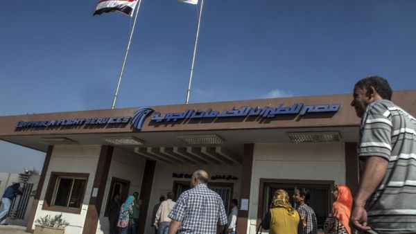 EgyptAir employees arrive to the in-Flight services hall at Cairo airport on May 19, 2016. (AFP/Khaled Desouki)