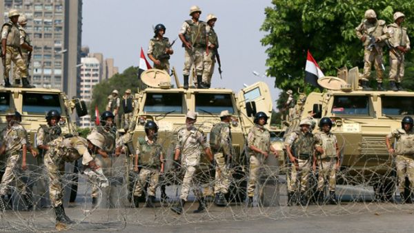 Egyptian army soldiers block Salah Salem highway to prevent supporters of the Muslim Brotherhood and ousted Egyptian president Mohamed Morsi from crossing during their demonstration in Cairo, on July 19, 2013.
(AFP/Marwan Naamani)