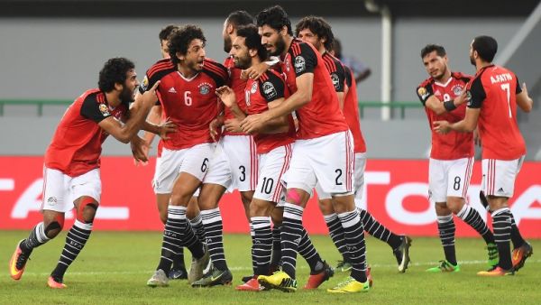 Egyptian team celebrates a goal during the group stages (Justin Tallis/AFP)
