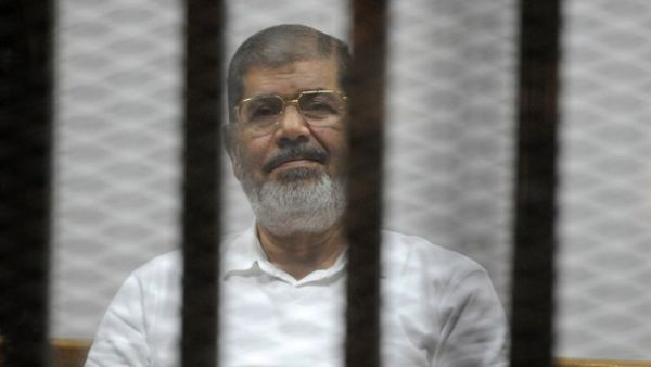 Deposed former president Mohamed Morsi in court (AFP/ File)