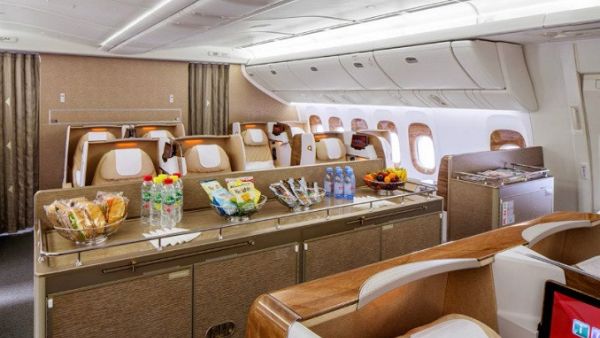 The new business class cabin features a social area – a mini lounge with snacks, sandwiches, fruits, and beverages. (Photo: Emirates)