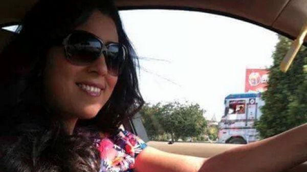 What man has made Ayten Amer smile so big? (Facebook)