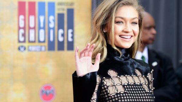 Gigi follows in the footsteps of stars including Chrissy Teigen, Kate Upton and Emily Ratajkowski in picking up the award. (AFP/Frazer Harrison)