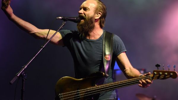 Barely recognizable, but Sting still had the crowd in full-on karaoke mode. (AFP/Fadel Senna)