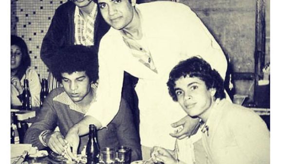Unlike his shaved-head look now, Amr had a full set of curly hair when he was a young man. (Image: Facebook)
