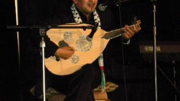 Doc Jazz plays his funky music to cure Palestinian ailments