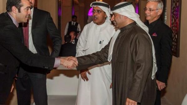 Mohammad al-Turki shaking hands at DIFF (Image: Twitter)