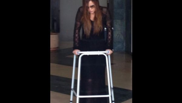 Carole Samaha is up and at 'em again with the support of a walker (Image: Twitter) Carole Samaha is up and at 'em again with the support of a walker (Image: Twitter)