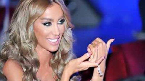 No shrinking violet, Maya Diab is hostile to the subject of divorce rumors 