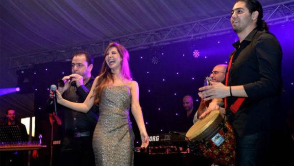 Nancy Ajram doesn't hold back and lets out what it's like to be an AI judge, singing star, and a mama. Nancy Ajram doesn't hold back and lets out what it's like to be an AI judge, singing star, and a mama.
