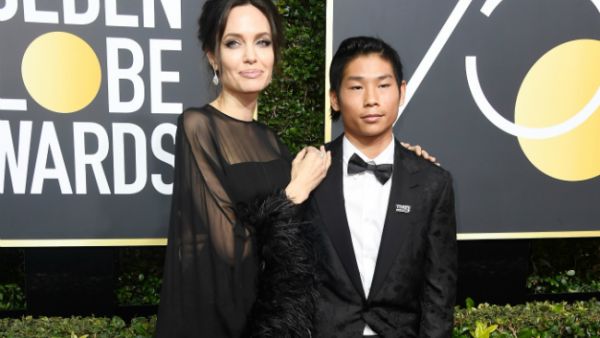 The 42-year-old actress and 14-year-old Pax attended the awards show Sunday at The Beverly Hills Hotel in Beverly Hills, Calif. (Source: Frazer Harrison - Getty Images North America  - AFP)
