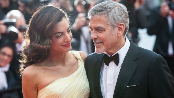 Amal and George Clooney, who've made this possible. (magicinfoto / Shutterstock.com)