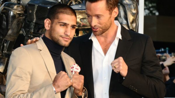 Amir Khan is seen with Australian actor Hugh Jackman. (Featureflash Photo Agency / Shutterstock.com)