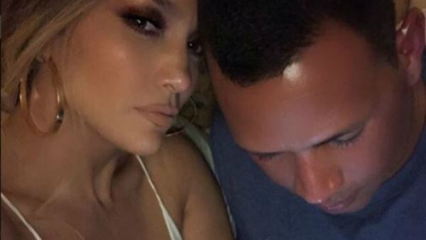 Lopez is voguing for the camera as Rodriguez appears to look at his phone in the picture she posted (Source: Instagram - @jlo)