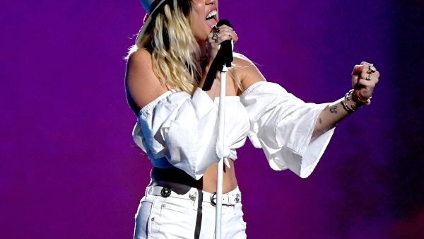Miley Cyrus teared-up during her 2017 Billboard Music Award performance—debuting the new Miley Cyrus. (Ethan Miller / GETTY IMAGES NORTH AMERICA / AFP)