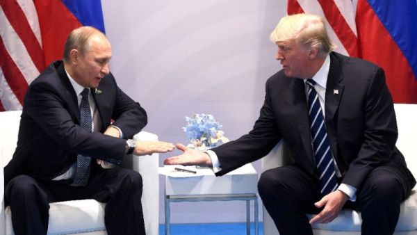 According to a White House statement, Trump thanked Putin for acknowledging America’s "strong" economic performance in his conference. (AFP/File)