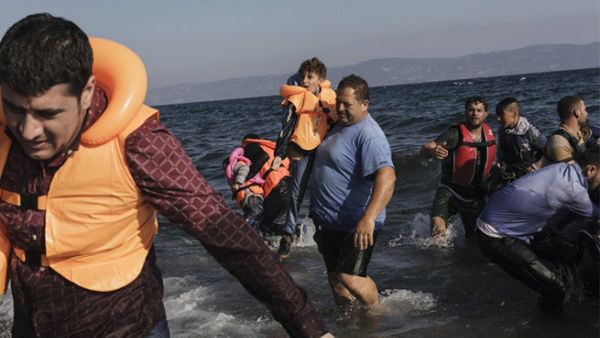 On the eve of renewed talks in Brussels, the video of Turkish fishermen saving a tiny refugee from the Aegean Sea means Aylan Kurdi's story could easily be repeated. (AFP/File)