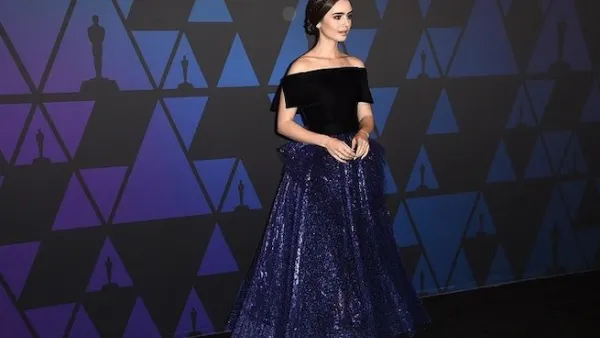 Lily Collins wore a gown by Georges Chakra. (AFP)