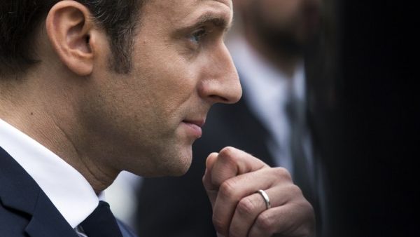 “If you are not in danger, you should go back to your country,” French President Emmanuel Macron told a Moroccan asylum seeker last week (AFP)