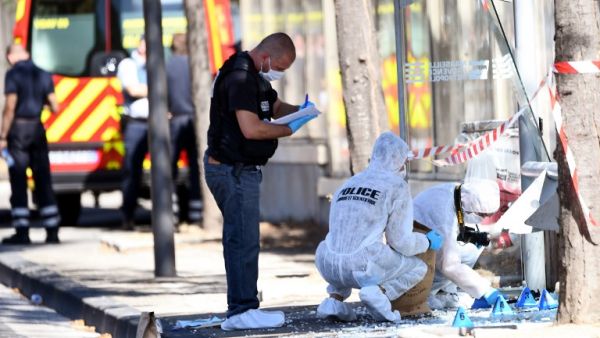 French forensic police search the site following a car crash on August 21, 2017, in the southern Mediterranean city of Marseille (AFP)