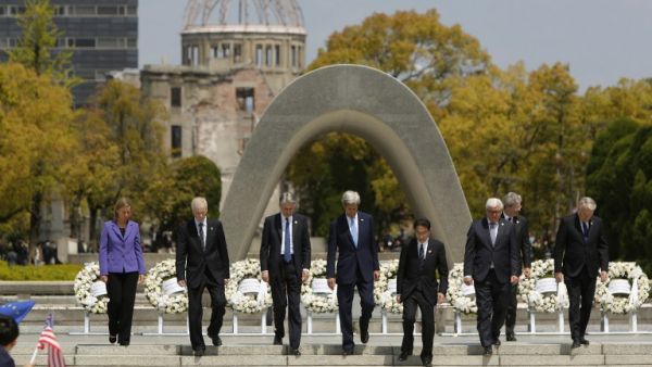 The G7 foreign ministers walk down the steps together after placing wreaths in front of the memorial in Hiroshima, Japan, on April 11, 2016. (AFP/Jonathan Ernst) The G7 foreign ministers walk down the steps together after placing wreaths in front of the memorial in Hiroshima, Japan, on April 11, 2016. (AFP/Jonathan Ernst)