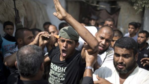 The killing has evoked a strong emotional response among activist youth, who took to the streets on Sunday after the Ramallah district court announced that al-Araj’s fellow prisoners in the case would still be tried in court for allegedly possessing weapons and planning an attack on Israel, despite the fact that four of the men remained held in Israeli custody. (AFP)