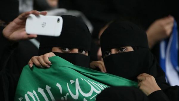 Saudi women take a selfie at a football game in September 2014.  (AFP/Karim Sahib)