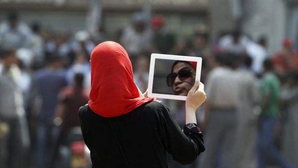 Photographer Roger Anis' photo essay "Closets of Dreams" sheds light on the clothes Egyptian women keep hidden in their closets out of fear of sexual harassment.  (AFP/File)