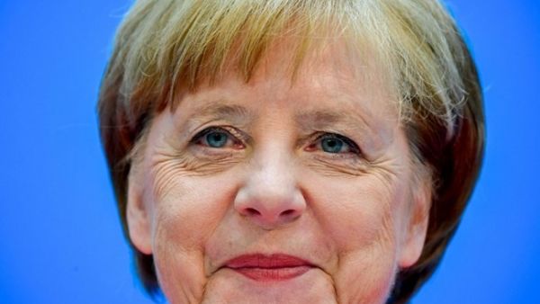 German Chancellor Angela Merkel addresses a press conference following a party leadership meeting at the CDU headquarters in Berlin on June 18, 2018.(AFP/ Tobias SCHWARZ)