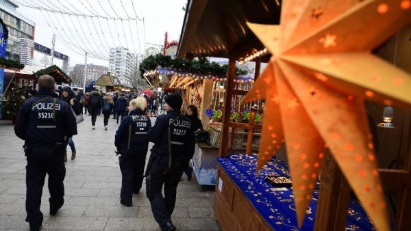 Police officers walk at the Christmas market near the Kaiser-Wilhelm-Gedaechtniskirche. (AFP/File)