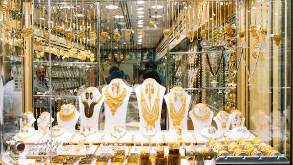 Global demand for gold rose slightly in the third quarter compared to the same period a year ago as resurgent buying from central banks and retail consumers balanced huge outflows from exchange traded funds, the WGC report said. (Shutterstock)