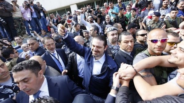 Saad Hariri takes a selfie after leaving a polling station in past poll (AFP/File Photo)	