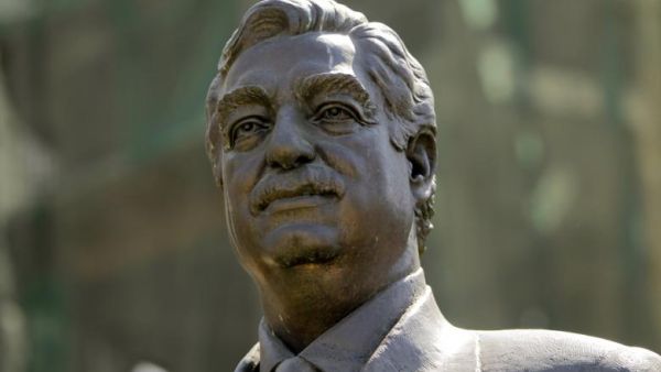 A bronze statue of slain prime minister Rafiq Hariri overlooks the site where he was killed in a massive blast in downtown Beirut. (AFP/Joseph Eid)