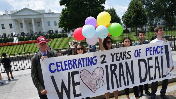 Activists commemorate the nuclear deal with Iran in front of the White House (Mandel Ngan/AFP)