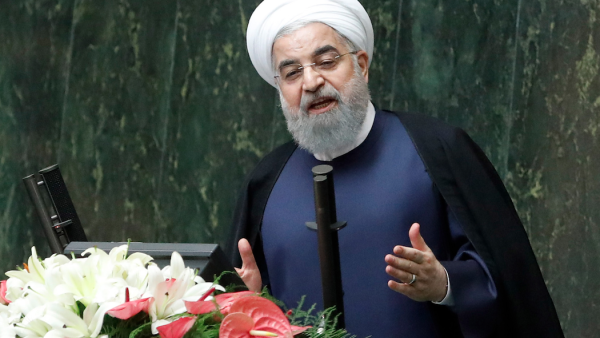 Iranian President Hassan Rouhani (C) delivers a speach to the parliament in Tehran on August 20, 2017, as Iran's parliament prepares to vote on the president's cabinet.
