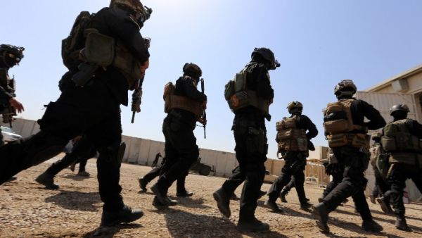 Members of the "Golden Division", the special forces of the Iraqi counter-terrorism forces (ICTF), take part in a training under the command of international military instructors in Baghdad on March 20, 2016. (AFP/Sabah Arar)