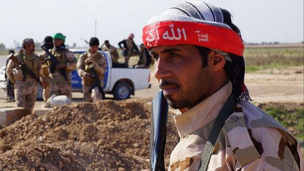 A Hashd al-Shaabi fighter in 2015 (Wikimedia Commons)